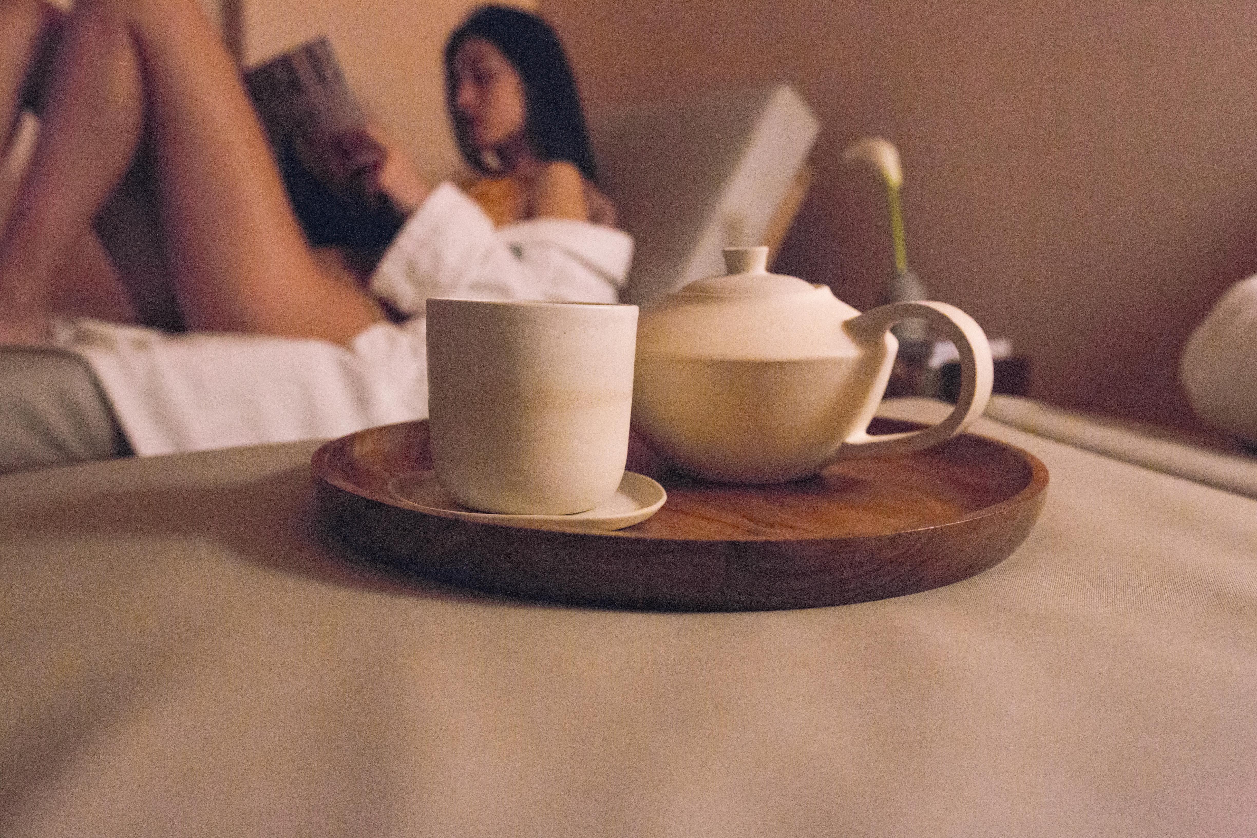 The Vintage Hotel & Spa Лиссабон Экстерьер фото A woman relaxing with a cup of tea
